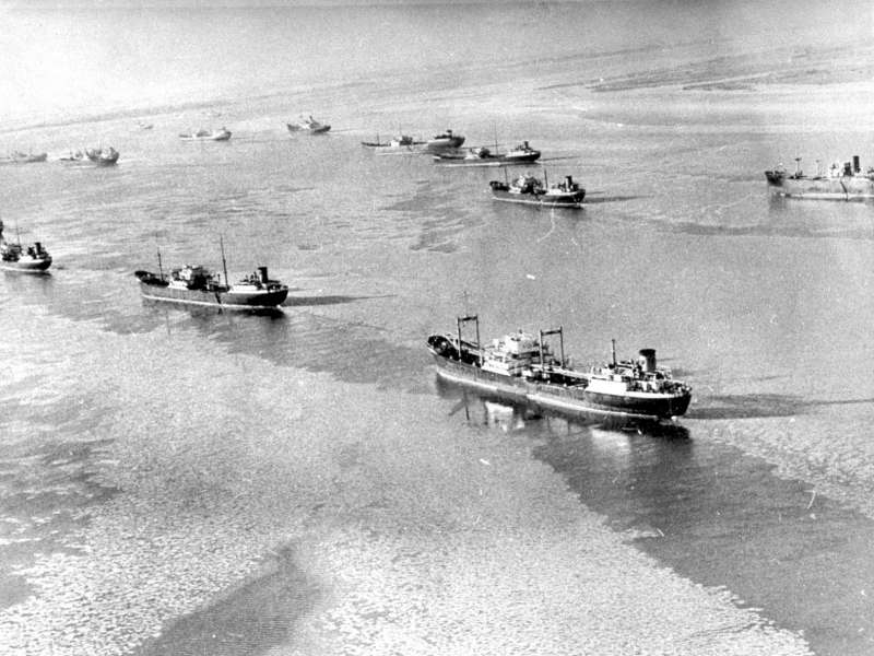 Looking towards the Tollesbury shore. Ships laid up in the River Blackwater in the icy winter of 1963. The boats from Mersea were unable to get out to the ships and the watchmen had to be supplied by helicopter. The nearest ship is thought to be the SAN VERONICO as she is the only one of the former Eagle Oil tankers with the large kingpost in front of the aft accommodation.

A cropped version of this photograph was in Essex County Standard 1 February 1963 Date: 1 February 1963.